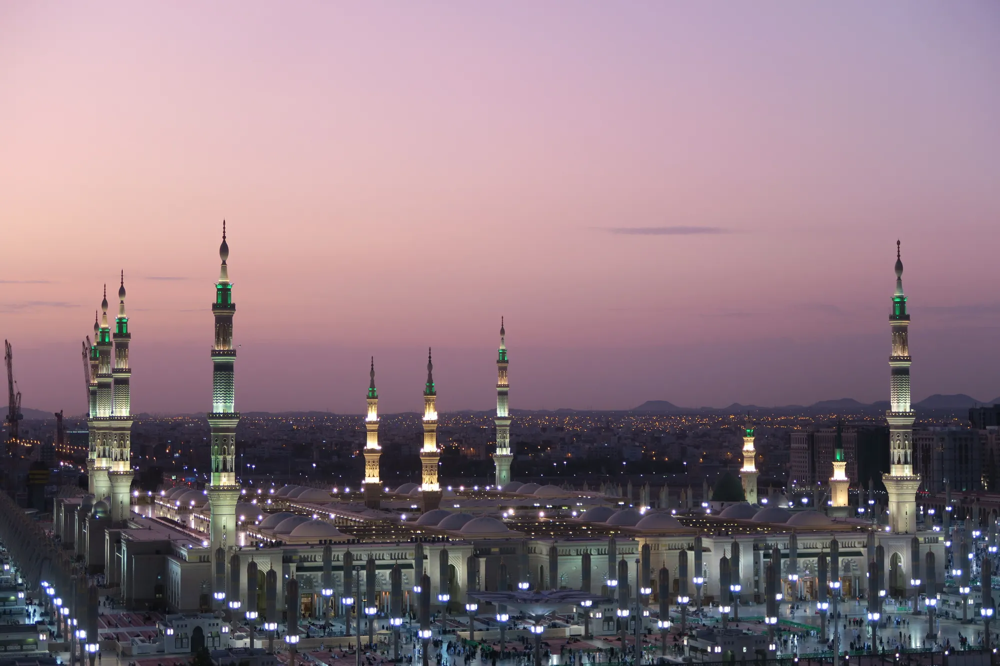Al-Masjid an-Nabawi, the Prophet's Mosque, lit at dusk in Madinah