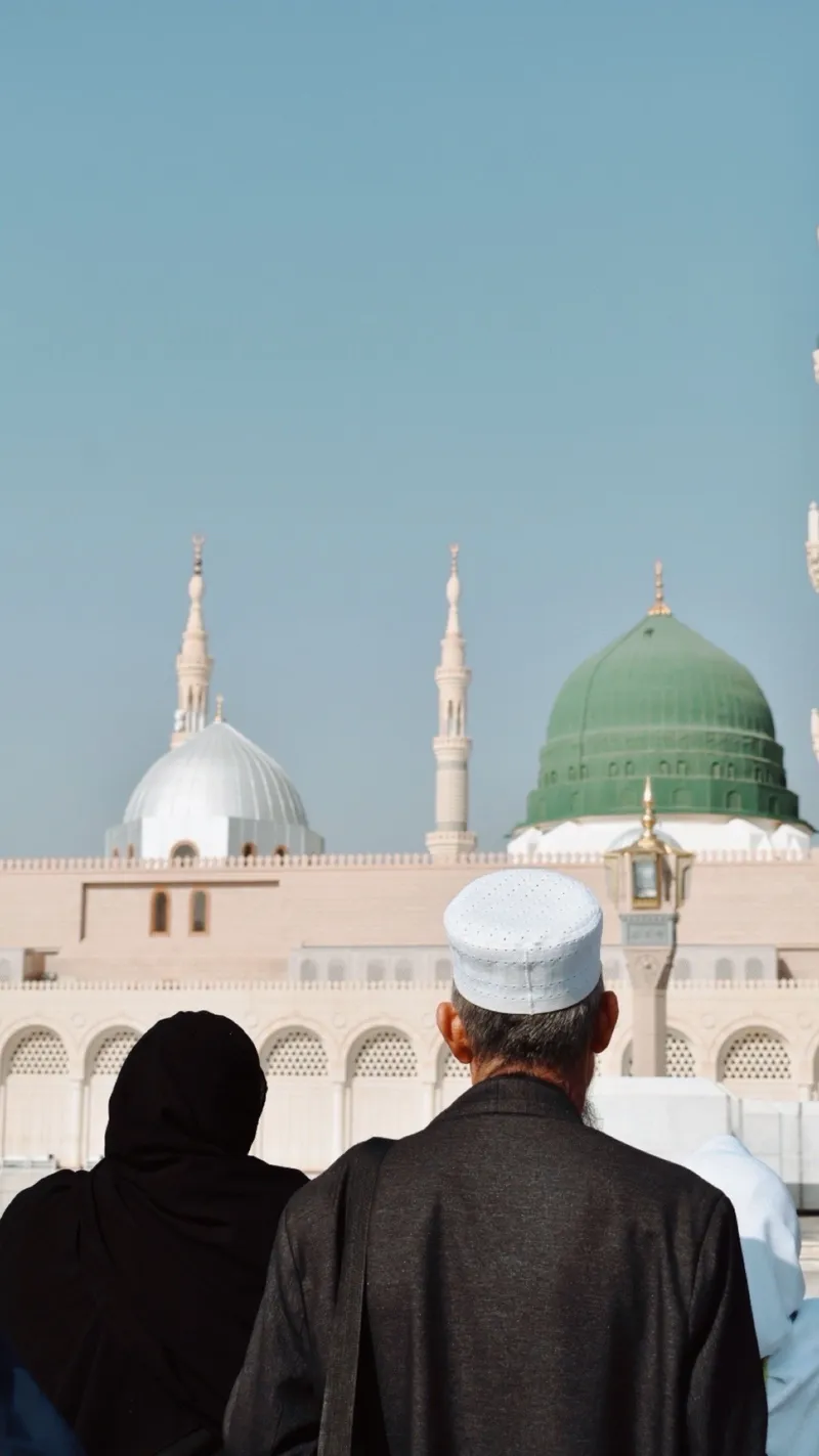 Pilgrims facing the Prophet's Mosque, Madinah